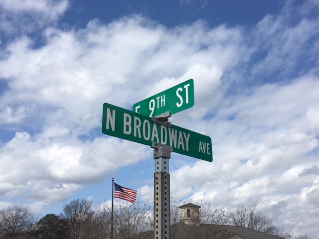 Motorcycle driver transported to hospital after colliding with sedan on Broadway Ave. and 9th St
