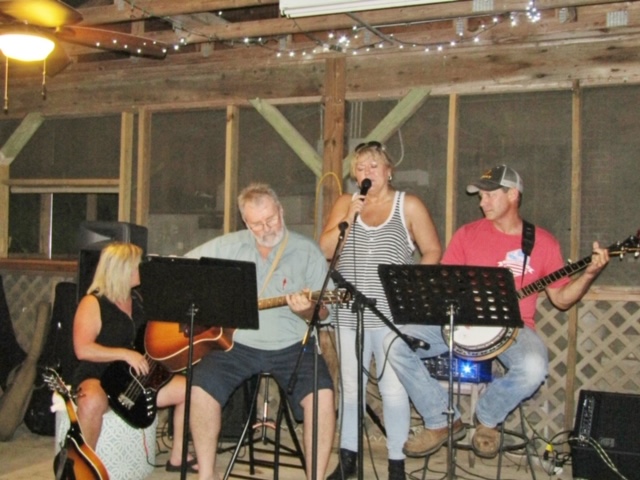 Music on the creek bank; mic night at Kymulga Grist Mill