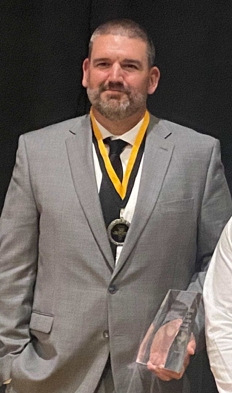 How Coach Adam Fossett changed the culture of B.B. Comer athletics