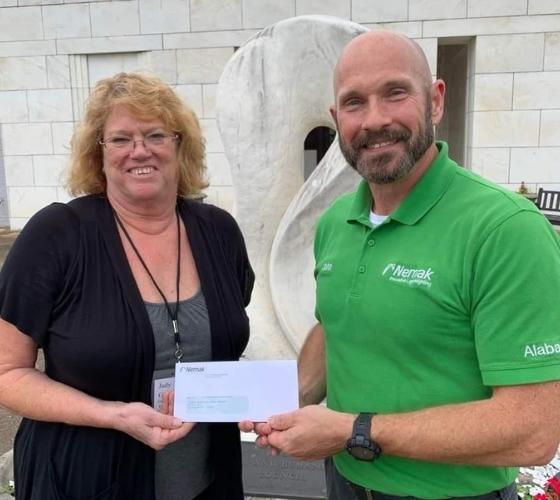 Nemak presents Comer Museum and Arts Center with $1,000 check