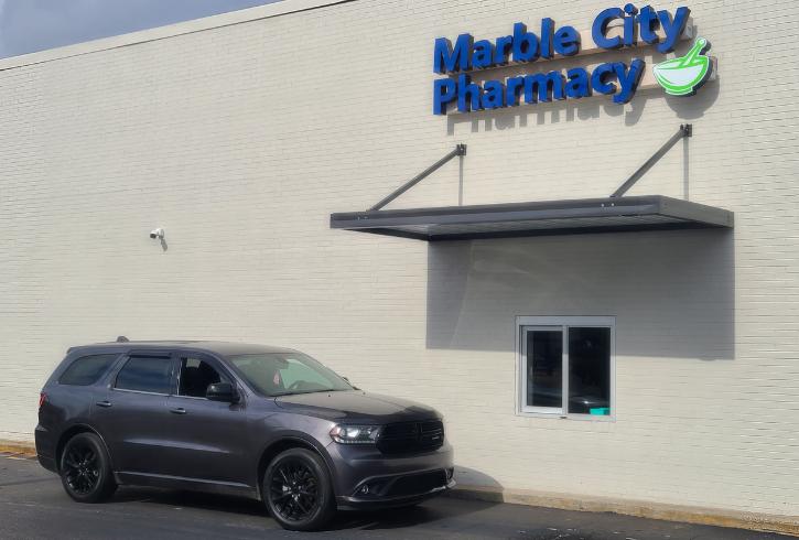 Marble City Pharmacy unveiling drive-thru, remodeled building with ribbon-cutting ceremony Monday