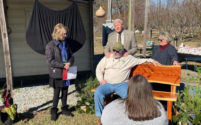 “Giver, servant, role model.” Sylacauga’s Bill Roberts honored with surprise dedication at community garden