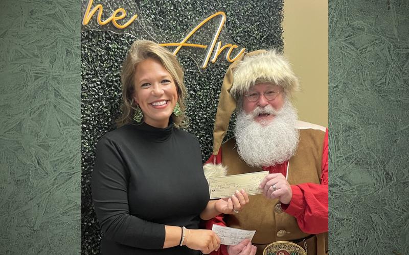 Santa spreads magic, generosity by giving back winnings to The Arc of South Talladega County