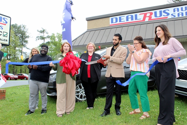Deal-R-Us Auto Sales celebrates grand reopening of their dealership in Childersburg with a ribbon-cutting ceremony