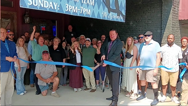 A great crowd was on hand to celebrate a pair of new downtown Childersburg businesses