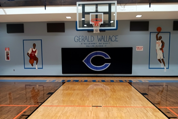 Former NBA star Gerald Wallace honored with a mural inside the R.S. Limbaugh Community Center gym
